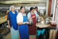 ladies preparing food in the kitchen at GHS