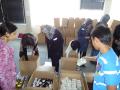 Al Mizan Trust volunteers making food parcels